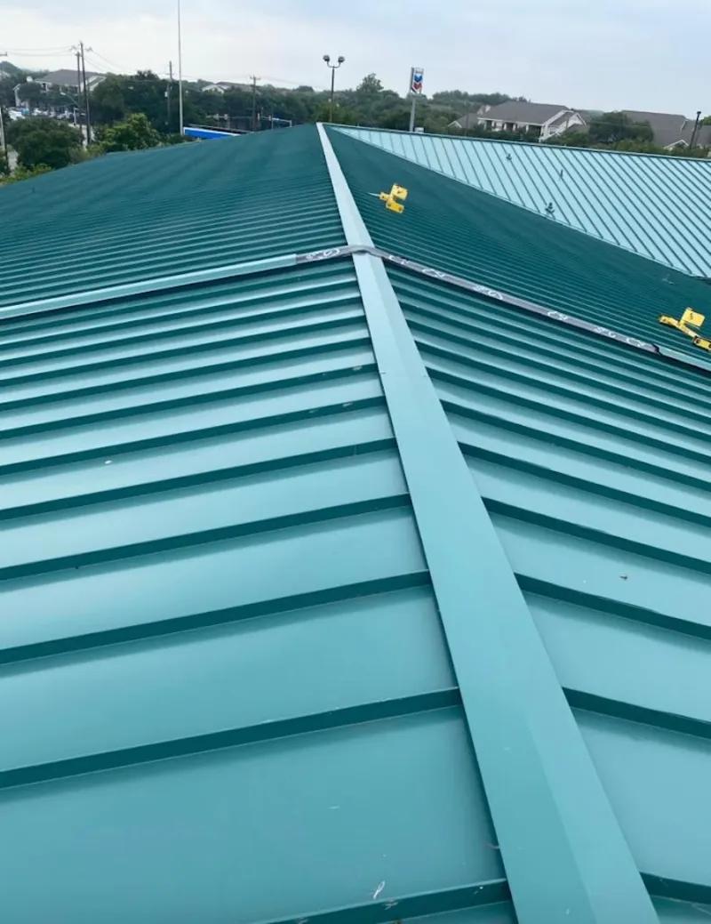 Green commercial metal roof ridge and valley for Metal Roof Repair in Lynn